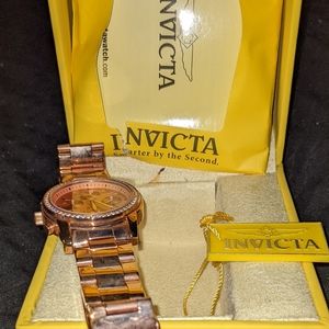 Invicta rose gold watch.